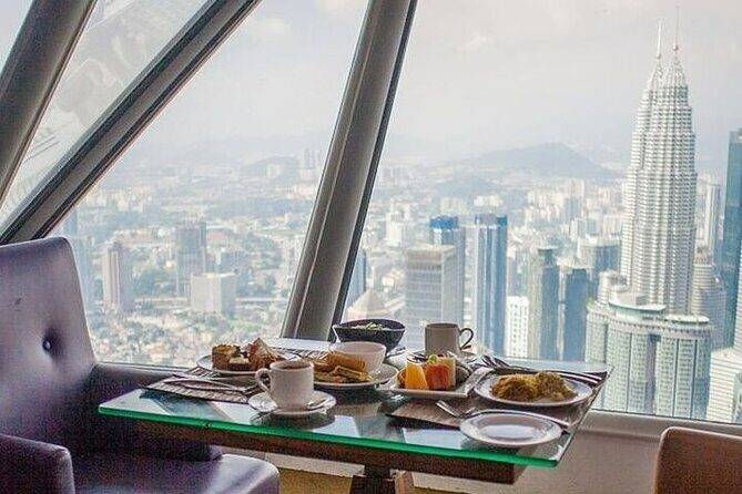 2-WAY FLIGHT: Private Kuala Lumpur guided day tour from Singapore - Lunch at a 5-Star Hotel Restaurant: Real Break Time in the Middle