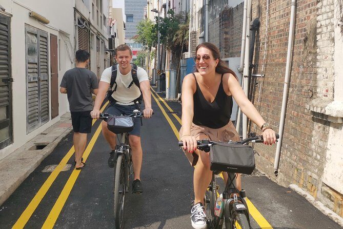 Historical Singapore Bike Tour on Full-Sized Bicycles - Meeting at Let’s Go Bike: storage, water, and a quick safety setup