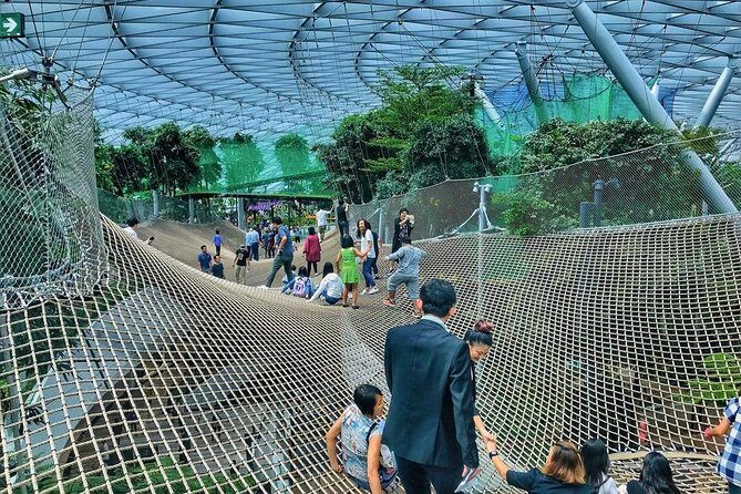 Singapore Changi Jewel Highlights Walking Tour - Stop 1: Jewel Changi Airport and the dome/waterfall engineering story