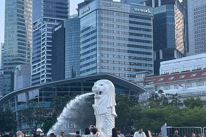 Singapore Half Day City Tour w Skypark and Gardens By The Bay - Merlion Park and the Fountain of Wealth: iconic photos, quick context