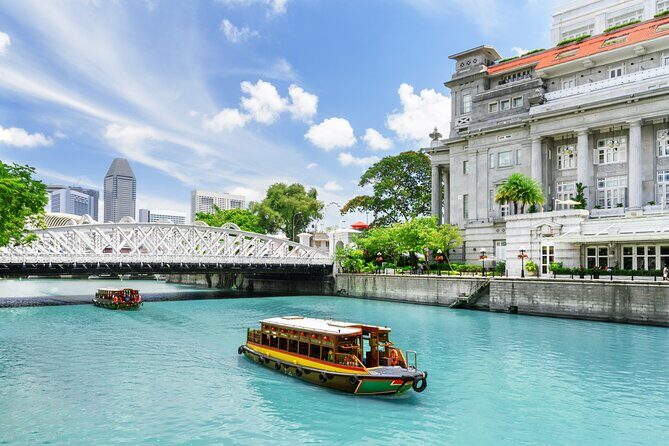 Singapore River Cruise, Night Garden Rhapsody & Spectra by CYT - Merlion Park at golden hour: the skyline warm-up